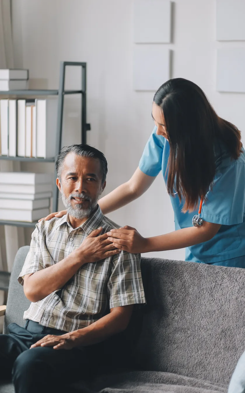 Care staff guiding elderly residents and answering questions
