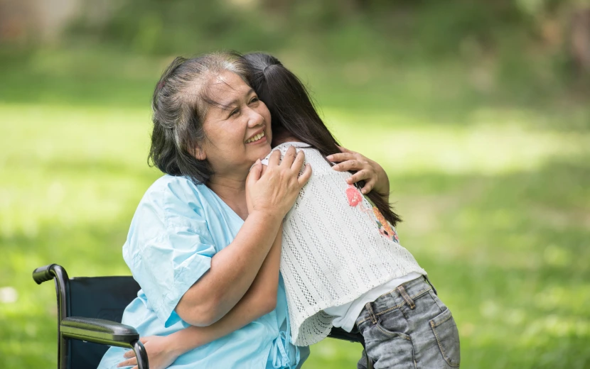 Dedicated caregiver assisting elderly resident with mobility